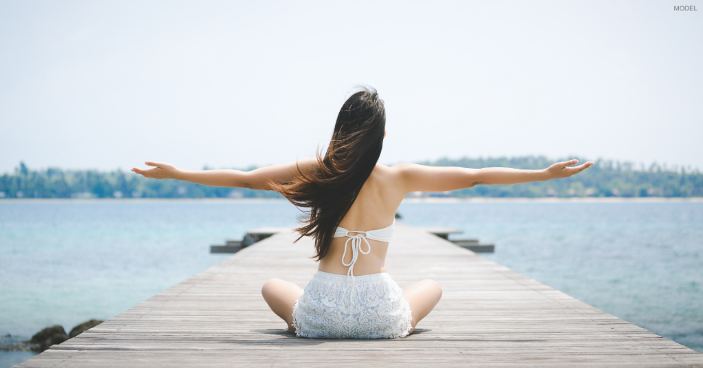 Woman feeling confident in a bathing suit after laser hair removal in Anchorage, AK